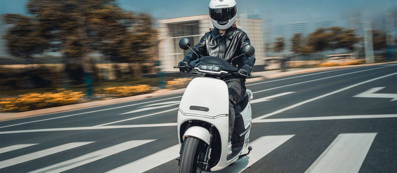 rider on electric scooter with blurred background