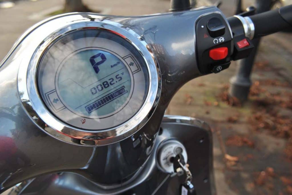 LCD dashboard and key barrel on the Artisan EVC moped